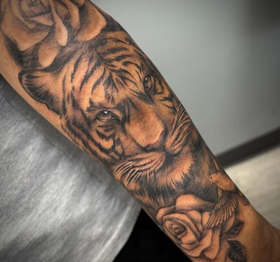 Black and grey tiger, roses and dove forearm sleeve