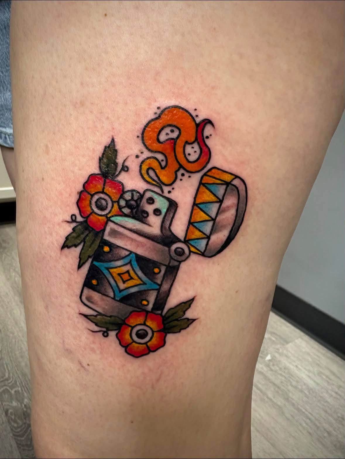 Traditional color lighter with flowers and flame tattoo