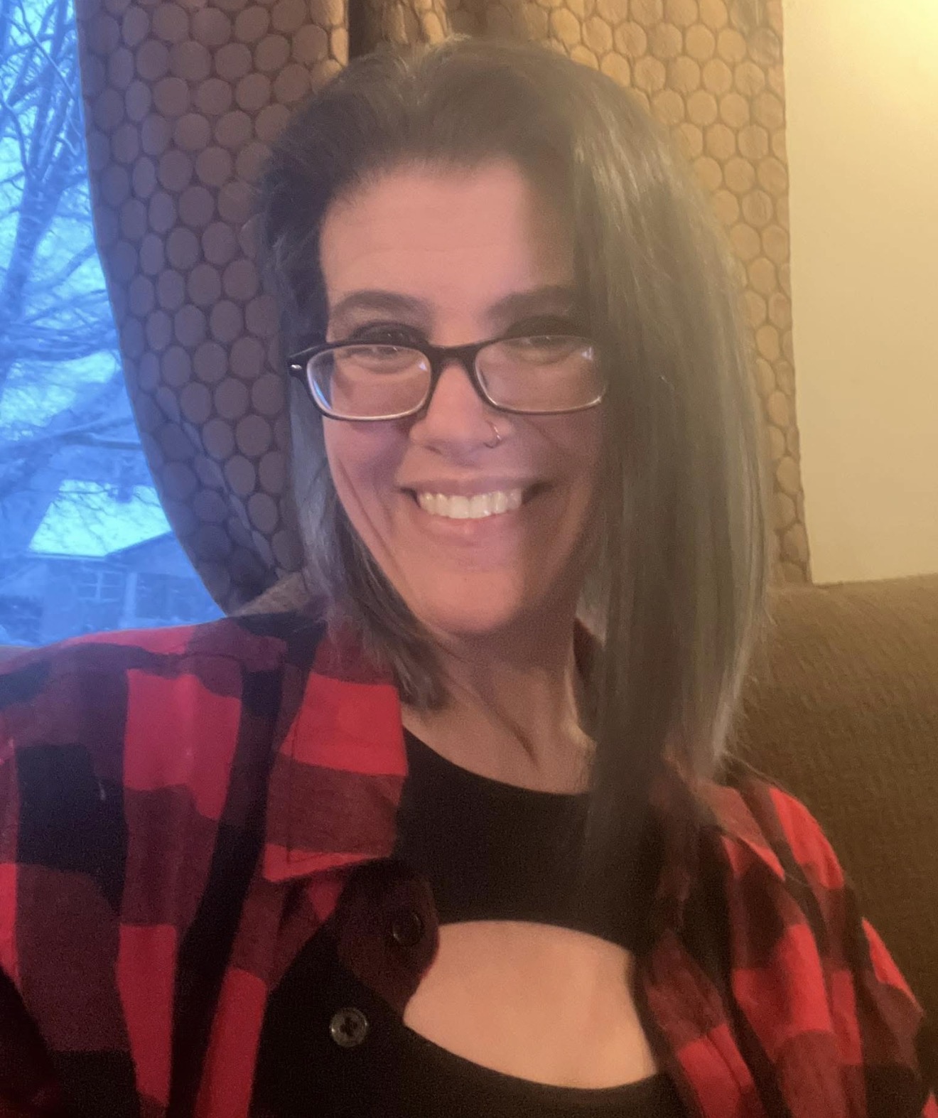 Lori, artist at The Ink Shop
