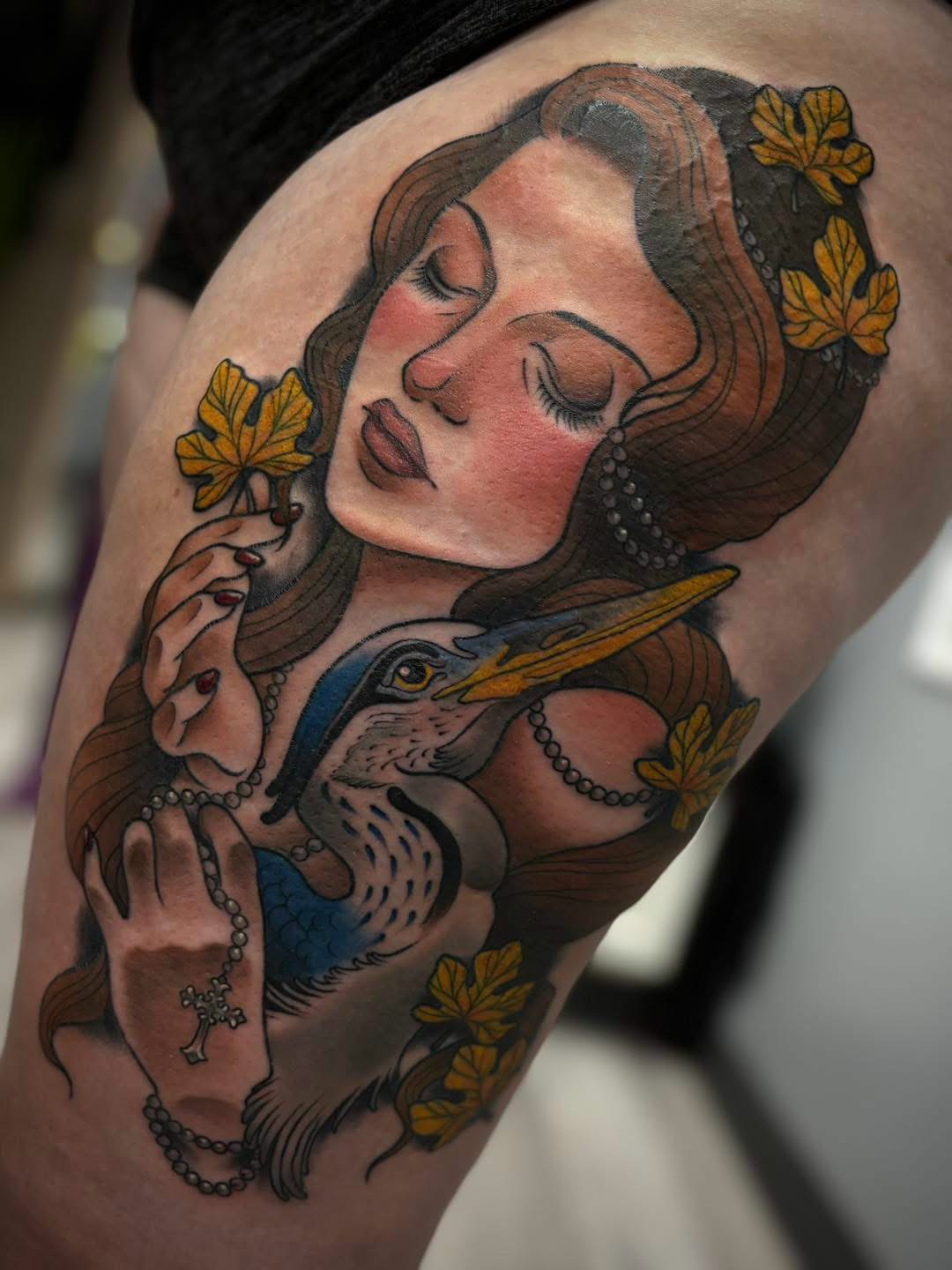Color neo-traditional portrait with a heron and autumn leaves on a thigh
